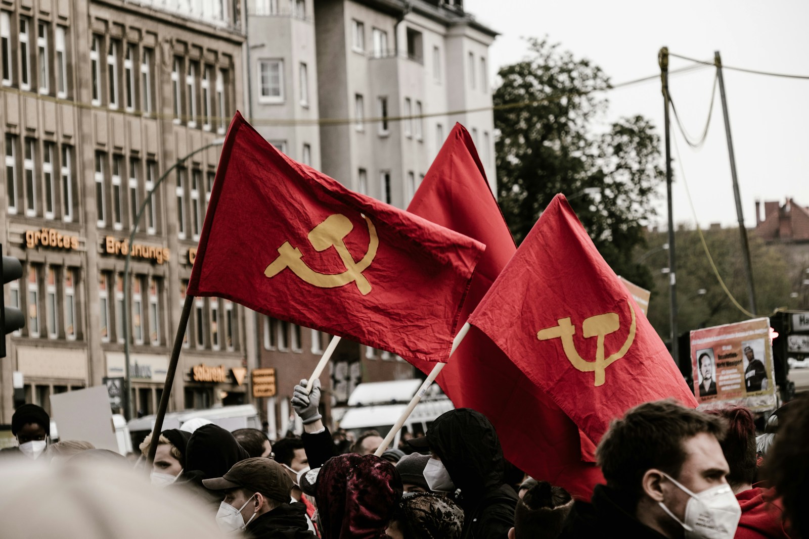 people holding flags during daytime